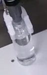 100mL ポリ容器 充填機 開発技研
