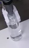 100mL ポリ容器 充填機 開発技研
