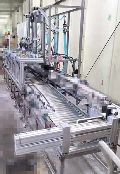 BIB用高速液体充填機 AS3型 outport